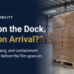 Gemini_Generated_Image_yox35oyox35oyox3 - Korpack - Packaging Solutions for Complex Businesses Warehouse scene with a pallet of boxed goods on the right and a dark blue banner reading 'Unit Load Stability' on the left.